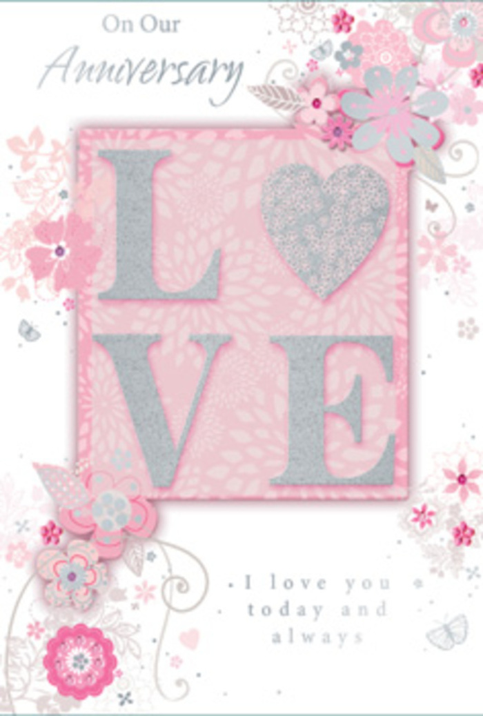 This anniversary card is composed with the same care and balance that goes into arranging a romantic bouquet at Noak Hill Florist. In the centre, the word "LOVE" is displayed in large, raised letters that create a striking focal point. The surface of the letters is dusted with micro-fine glitter, so they sparkle with a refined sheen rather than a harsh shine. The colour palette blends muted blush pinks, warm whites, and silvery highlights, giving the impression of layered petals catching different angles of light. A soft blush panel behind the word adds gentle contrast, making the central motif seem to gently glow, like candlelight on a table laid for an anniversary dinner in a Noak Hill home. Flowing out from this centre are delicate drawings of stylised flowers, buds, and slender leaves. The blooms are rendered in long, fluid strokes of pink and pale grey, with shading that suggests volume and natural curves. Their arrangement feels intuitive and organic, similar to the way stems naturally fan out in a hand-tied bouquet. Fine flourishes and tendrils weave between the blossoms, lending a sense of movement, as if a light breeze were passing across a garden near Noak Hill's green spaces. The background is a soft, even pink, creating a serene backdrop that makes the silver accents glimmer discreetly. Nestled among the florals, a script-style anniversary message in elegant lettering reinforces the theme of enduring affection. The card comes across as both tactile and visually soothing, evoking the feeling of receiving fresh, blush-toned flowers and a handwritten note delivered together to a doorstep in Noak Hill.